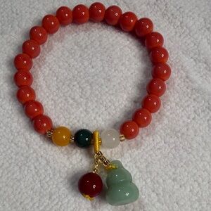 Elegant Beaded Bracelet with Charms